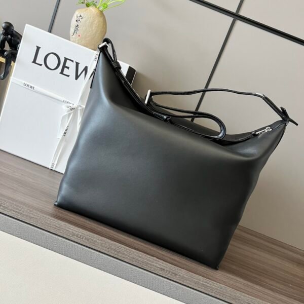 Soft and smooth cowhide and jacquard fabric handbag - Image 11