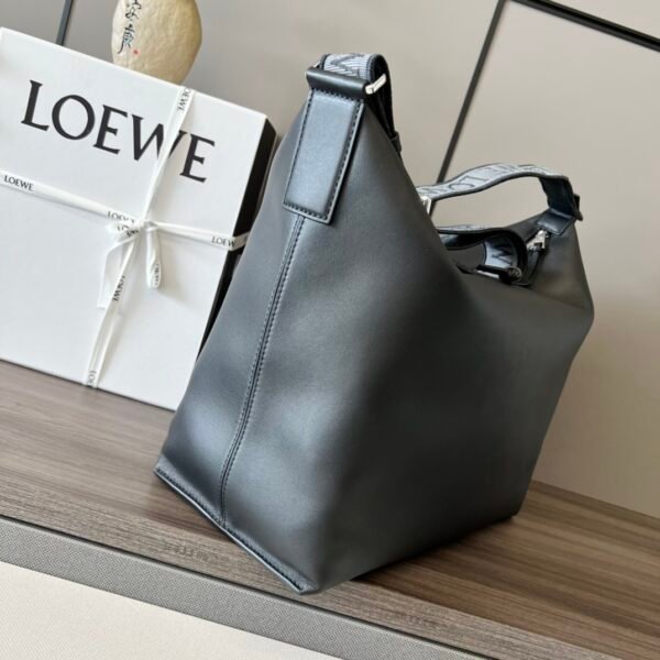 Soft and smooth cowhide and jacquard fabric handbag - Image 12