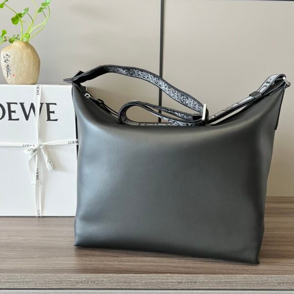 Soft and smooth cowhide and jacquard fabric handbag - Image 13